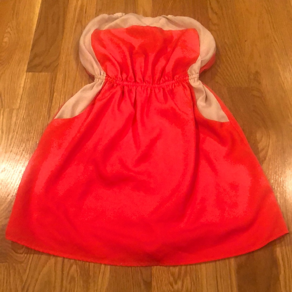 Adorable peach and tan doll baby dress size medium with two real pockets.